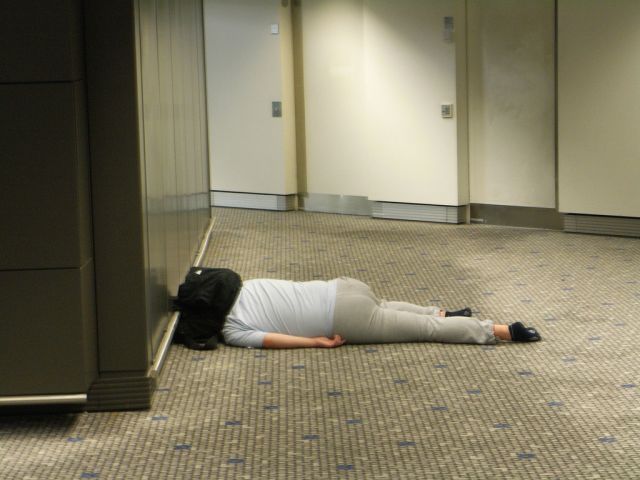 Desperate-Sleep-At-Airport